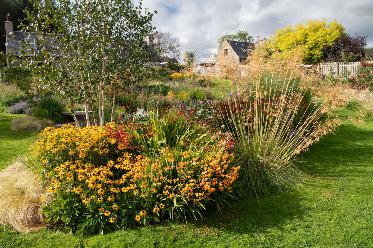 Garden With a View - Tigh Braigh, yellow/orange border