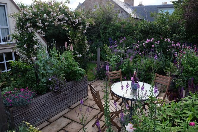 Mercat Cottage Rose Arch Seating Area ©Sheila M. Averbuch